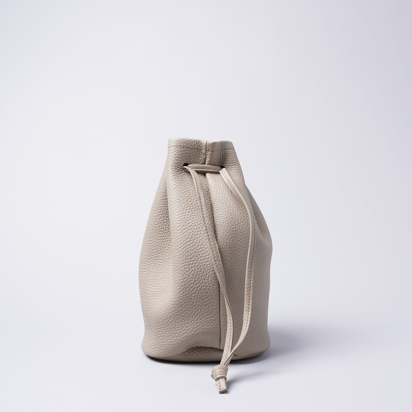 <LEZALI> Embossed Leather Draw String Mini Bag / Gold