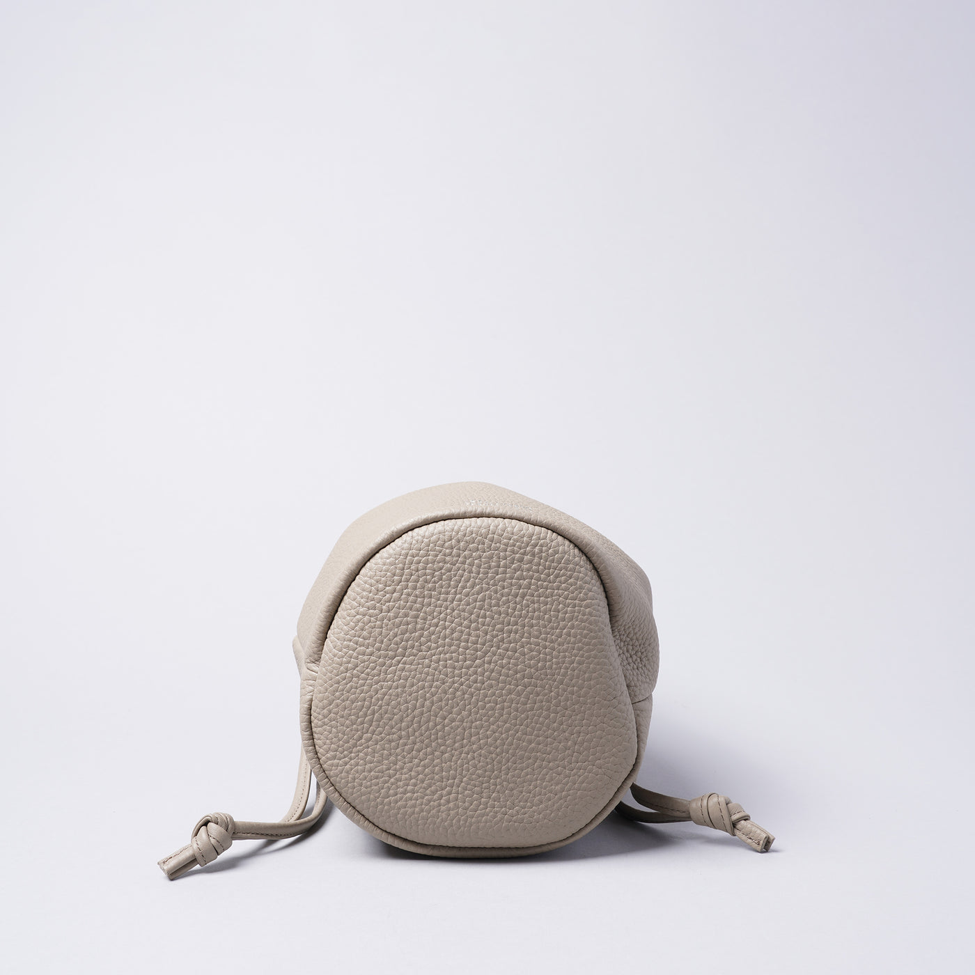 <LEZALI> Embossed Leather Drawstring Mini Bag / Taupe